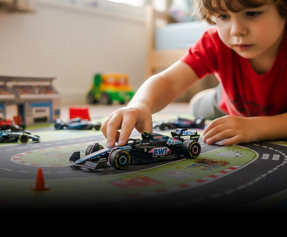 boy playing with car